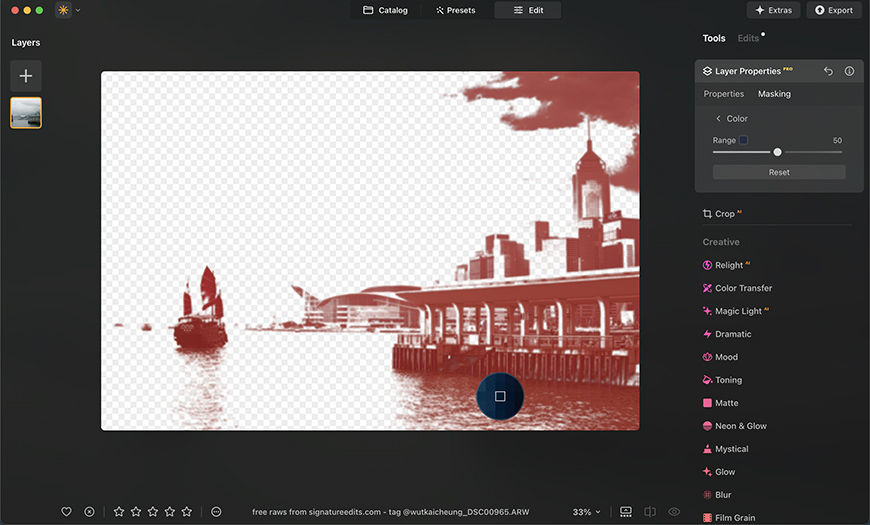 Image editing software interface showing a sepia-toned photo of a harbor with a boat and city skyline. Various editing tools and options are visible on the right side of the screen.