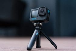 A gopro camera mounted on a mini tripod.