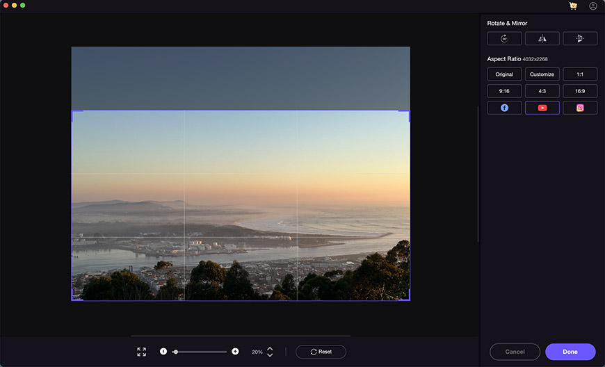 Photo editing software interface displaying a landscape image on the left with cropping gridlines and editing options on the right.