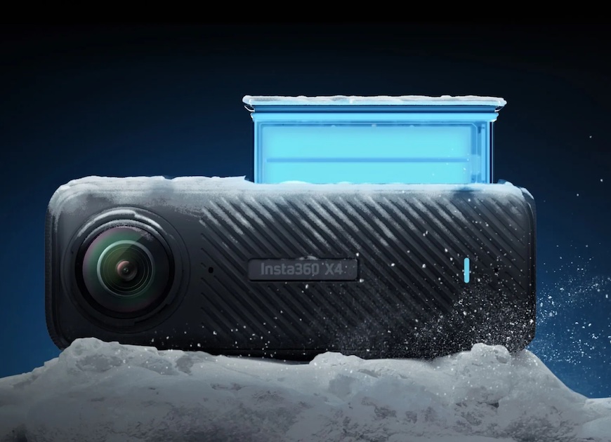 A black Insta360 X4 camera lies on a snowy surface with a blue translucent element above it, set against a dark background.