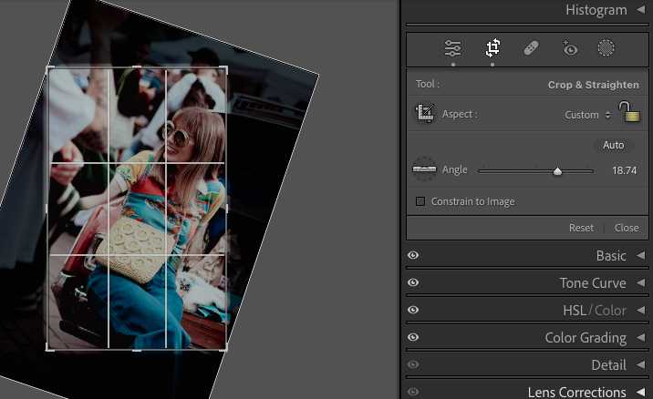 A photo editing interface is displayed. The image being edited shows a person wearing sunglasses and holding a yellow purse, while the editing tool options and histogram are visible on the right.