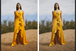 A woman in a flowing yellow dress stands on sandy terrain with a cloudy sky in the background.