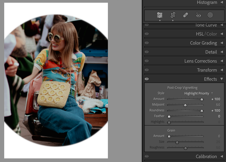 A person with long hair, wearing sunglasses and colorful clothing, sits outside and smiles. The image editing interface is visible on the right side of the photo.