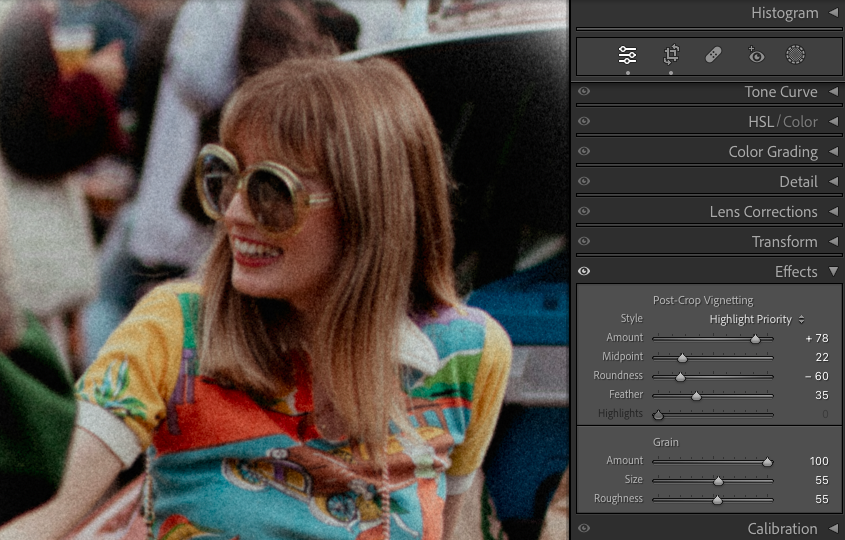 A person with long hair, wearing large round sunglasses and a colorful shirt, is smiling while standing outdoors. The image has photo editing settings visible on the right side.